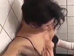Lesbians get hot in toilet cubicle 